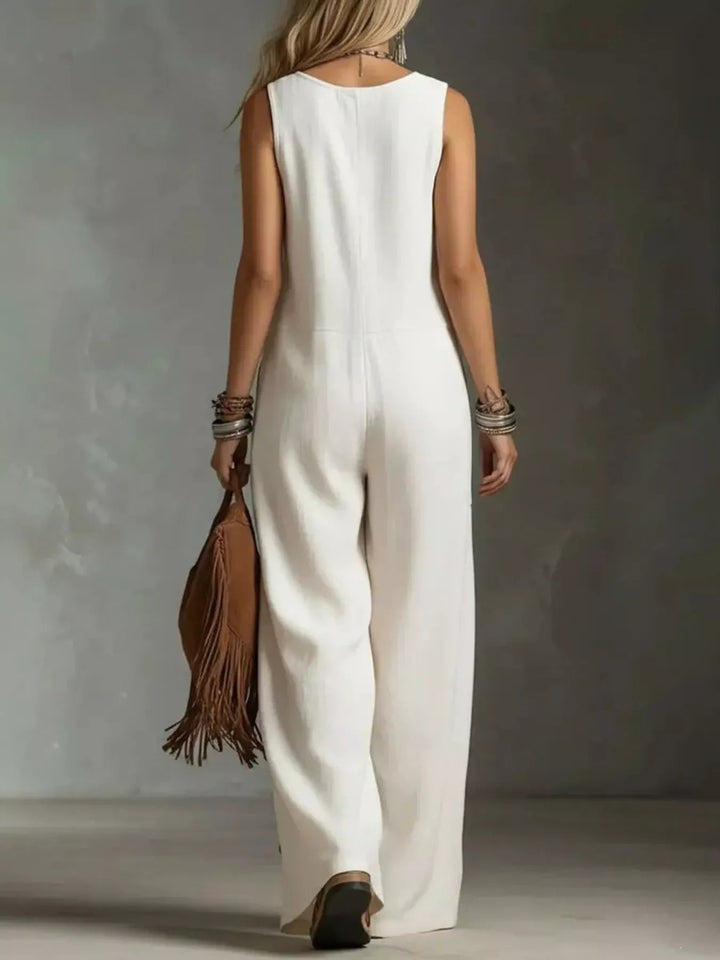 Ærmeløs jumpsuit med vide ben og knapper foran — Plus Size