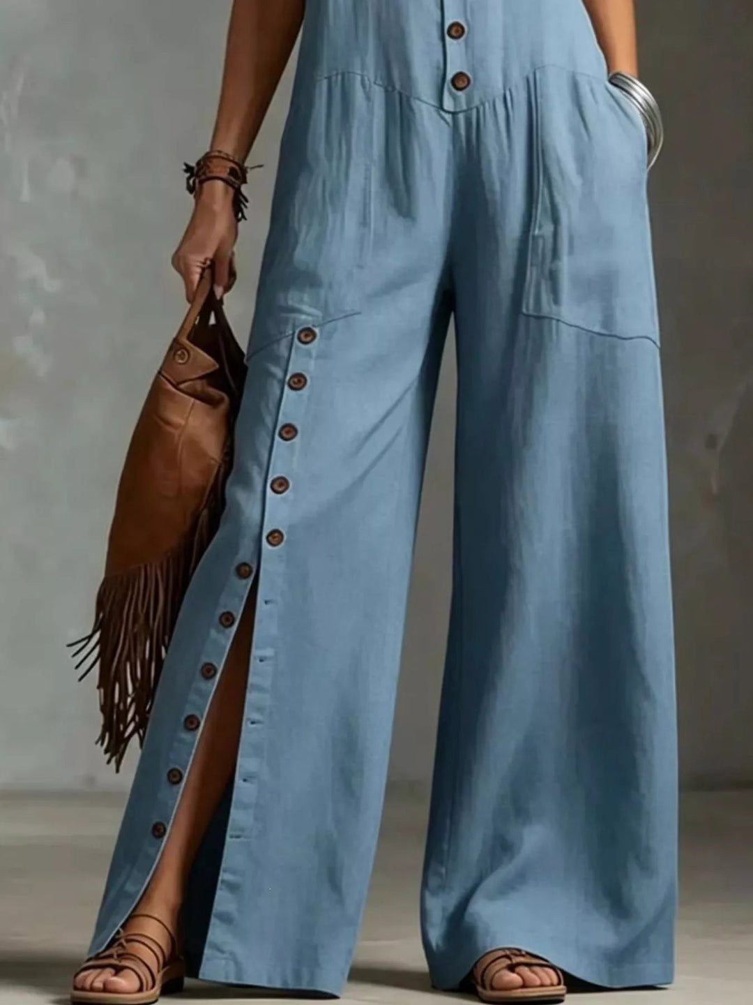 Ærmeløs jumpsuit med vide ben og knapper foran — Plus Size