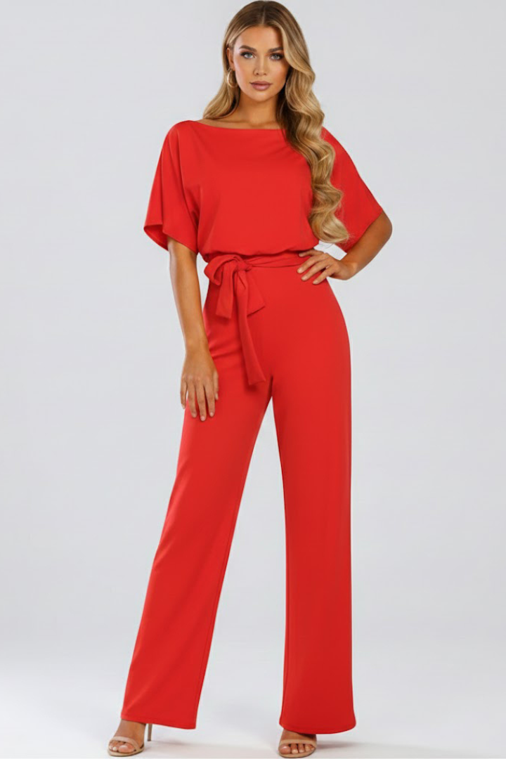 Damejumpsuit med bælte og vide ben