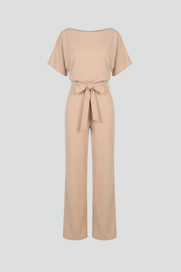 Damejumpsuit med bælte og vide ben