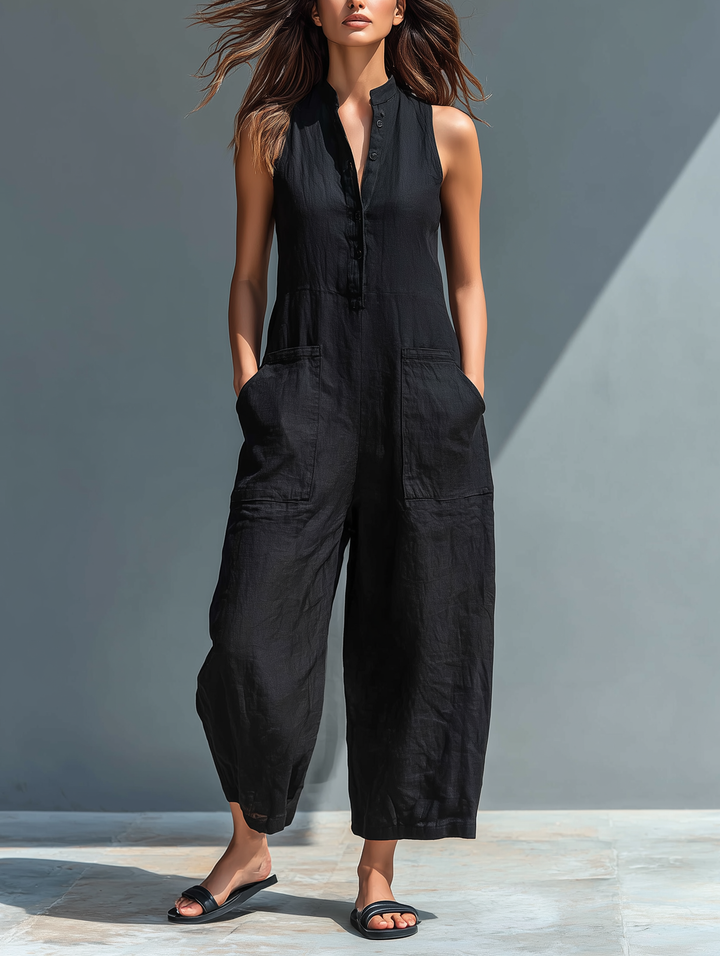 Minimalistisk damejumpsuit i hørblanding med knaplukning og stand-up-krave, ærmeløs og løs MDZ2725A5Y