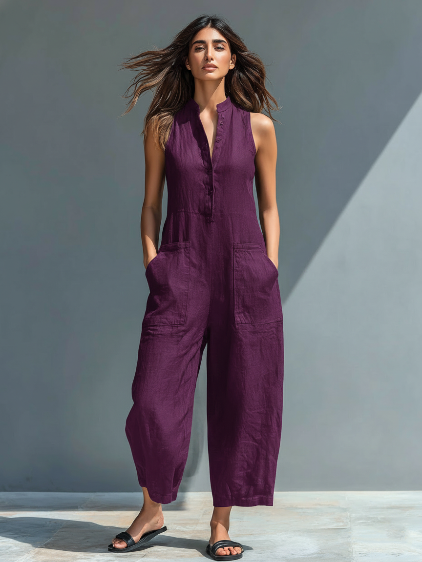 Minimalistisk damejumpsuit i hørblanding med knaplukning og stand-up-krave, ærmeløs og løs MDZ2725A5Y